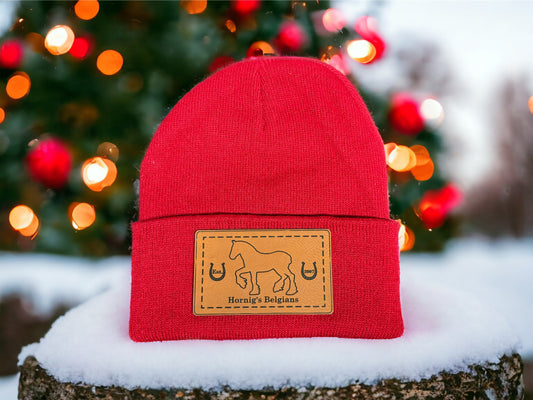 Knit beanie hat with a custom engraved leather patch