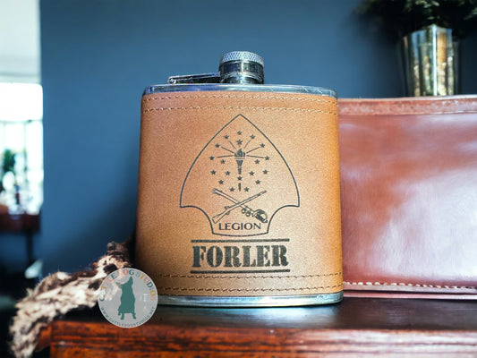 Personalized 6oz flask with an engraved leather wrap, a groomsmen gift